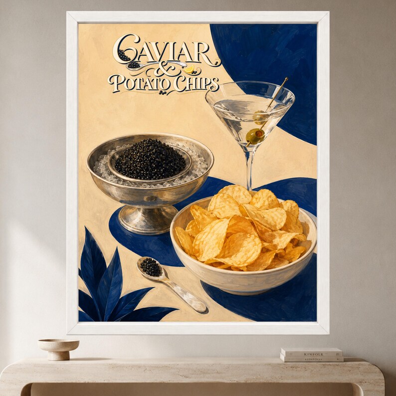 May include: A framed art print featuring the text Caviar & Potato Chips. The illustration depicts a silver bowl filled with black caviar, a martini glass with two olives, a small silver spoon with caviar, and a bowl of golden potato chips.