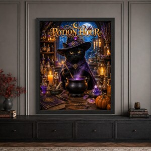 Framed black cat Halloween wall art featuring a witch cat in a purple hat and cloak stirring a glowing potion in a black cauldron, surrounded by crystals, potion bottles, candles and pumpkins beneath ornate “Potion Hour” typography.