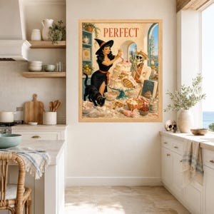 May include: A framed wall art print featuring a vintage-style illustration of a witch in a black dress and hat decorating a multi-tiered cake with a skeleton wearing a hat and sunglasses, with a black cat nearby and the word PERFECT at the top.