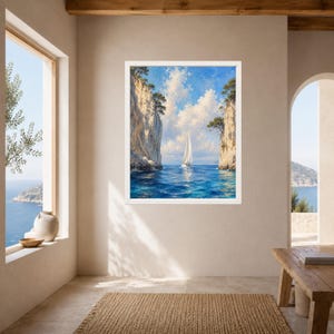 May include: A framed wall art print featuring a sailboat navigating through a narrow passage between two tall, light-colored rocky cliffs. The scene depicts deep blue water, a bright sky with white clouds, and green trees atop the cliffs.