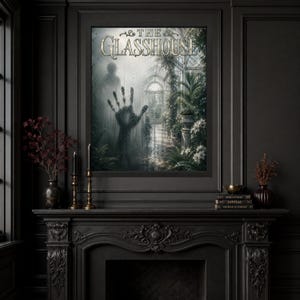 May include: A framed wall art print titled THE GLASSHOUSE featuring a dark, atmospheric greenhouse scene with a large, misty handprint on the glass pane, surrounded by lush green foliage, white flowers, and a shadowy figure in the background.