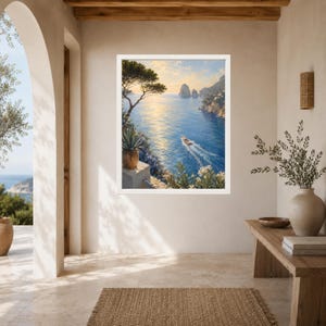May include: A framed wall art print depicting a coastal landscape with a small boat traveling across a sunlit blue sea. The scene features rocky cliffs, a pine tree, and potted plants in the foreground under a soft, golden-hued sky.