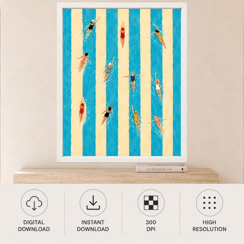 May include: A framed art print featuring an aerial view of swimmers in various colored swimsuits floating in blue water lanes separated by vertical beige stripes. The swimmers are depicted in different poses, including swimming and floating.