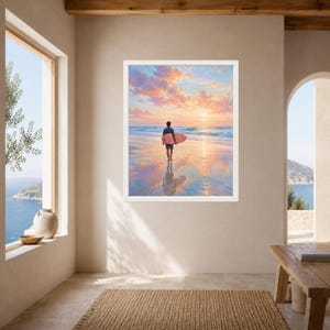 May include: A framed wall art print depicting a person walking on a wet sandy beach at sunset while carrying a pink surfboard. The sky is filled with soft pink and orange clouds, and the ocean waves are gentle, reflecting the vibrant colors.