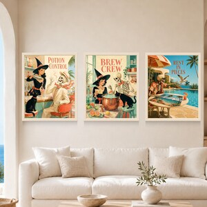May include: Three framed wall art prints featuring retro-style illustrations. The first shows a witch and skeleton at a bar with the text Potion Control. The second shows a witch and skeleton brewing with the text Brew Crew. The third shows a skeleton by a pool with the text Rest in Pieces.