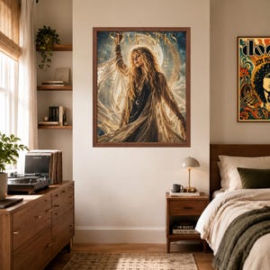 May include: A rectangular framed wall art print featuring a portrait of Stevie Nicks with long wavy blonde hair, wearing a flowing sheer garment, set against a celestial background with a large moon and gold lettering reading Stevie Nicks.