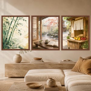 May include: A set of three framed wall art prints featuring Japanese-inspired scenes. The left print shows a bamboo forest path, the center depicts a wooden porch with a tea set and book, and the right shows a market stall with produce.