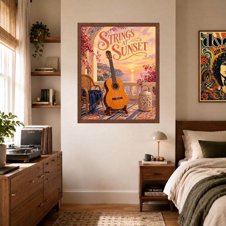 May include: A framed wall art print titled Strings at Sunset featuring a classical acoustic guitar standing on a balcony overlooking a coastal sunset with pink flowers, a wicker chair, and a decorative lantern under a stone archway.