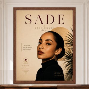 May include: A framed poster featuring a portrait of Sade with the text SADE LOVE DELUXE. The design includes a gold circle, a palm leaf, and text that reads I see only you, only you have that magic technique, TIMELESS SOUL ELEGANCE, and THE VOICE. THE VIBE. THE STANDARD.