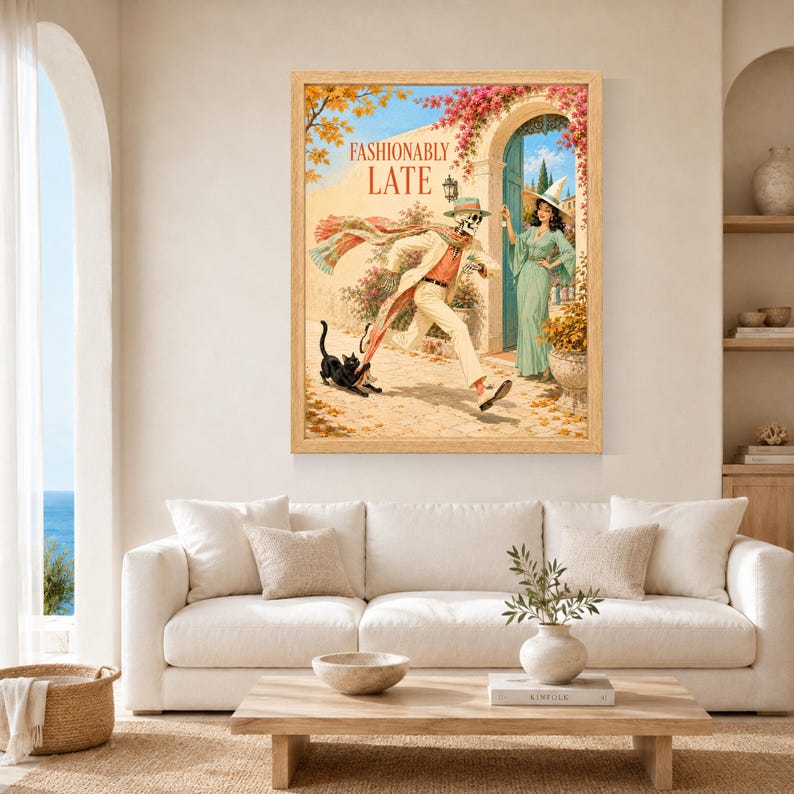 May include: A framed wall art print titled FASHIONABLY LATE featuring a skeleton in a beige suit and hat running with a long scarf, a black cat, and a person in a green dress and witch hat standing in a stone archway with pink flowers.