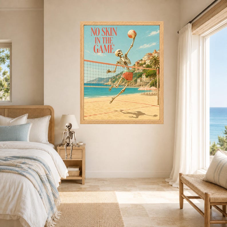 May include: A framed wall art print featuring a skeleton playing volleyball on a beach with the text NO SKIN IN THE GAME. The scene depicts a coastal town, blue ocean, and sandy shore. The skeleton wears red shorts and reaches for a volleyball.