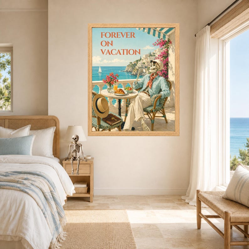 May include: A framed wall art print titled FOREVER ON VACATION featuring a skeleton sitting at a round table on a balcony overlooking the sea. The skeleton wears a light blue shirt, red scarf, and white pants, with a straw hat on a nearby chair.