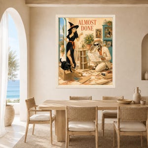 May include: A framed wall art print titled ALMOST DONE featuring a retro-style illustration of a person in a black dress and witch hat, a skeleton in a beige suit reading blueprints, and a black cat in a cardboard box on a tiled floor.