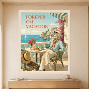 Framed Forever on Vacation skeleton wall art featuring a sunglasses-wearing skeleton drinking coffee on a sunny Mediterranean terrace with turquoise sea, croissant, flowers and coastal village.