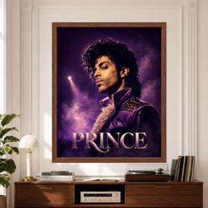 Framed Prince wall art featuring a vintage-inspired 1980s music portrait in a purple stage jacket with ruffled shirt, dramatic violet concert lighting, smoky atmosphere and large elegant Prince typography above a record player console.