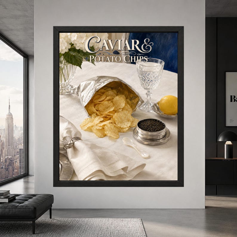 Framed caviar and potato chips wall art showing an open bag of golden chips beside black caviar, crystal glassware, lemon and white linen beneath decorative Caviar & Potato Chips lettering.