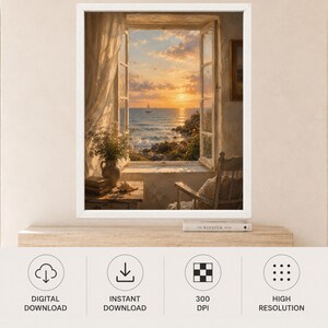May include: A framed wall art print depicting an open window view of a sunset over the ocean with a sailboat, sheer curtains, a vase of flowers on a table, and a wooden chair. Below the frame sits a book titled The Kinfolk Home on a shelf.