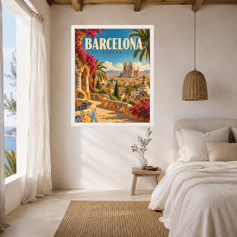 May include: A framed travel poster featuring a vibrant illustration of Barcelona, Spain. The artwork displays the Sagrada Familia in the distance, framed by colorful mosaic walls and bright pink bougainvillea flowers under a clear blue sky.