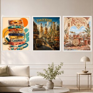 May include: Three framed wall art prints. The left print shows a stack of colorful cassette tapes with headphones and the text REWIND. The center print depicts a city canal scene with violins and the text VIOLIN WHARF. The right print shows a drum set on a balcony with the text SUNLIT RHYTHM.