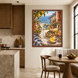 May include: A framed wall art print depicting a Mediterranean coastal scene on a marble table. The image features a martini glass with olives, a tin of sardines, lemon wedges, a bowl of green olives, and a blue and white striped cloth.