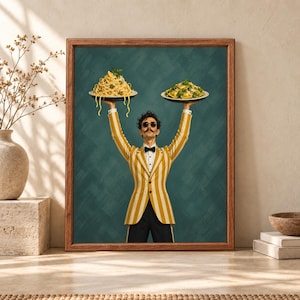 Framed Italian pasta wall art showing a stylish mustached waiter in a yellow striped jacket raising plates of spaghetti and ravioli against a deep teal background.