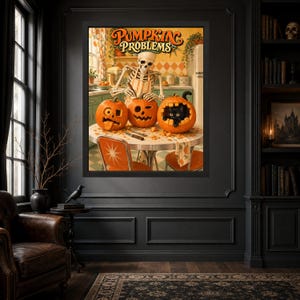 May include: A framed wall art print titled Pumpkin Problems featuring a skeleton in a kitchen carving pumpkins. One pumpkin has a face with a tongue sticking out, another is carved with a winking face, and a black cat sits inside a third pumpkin.
