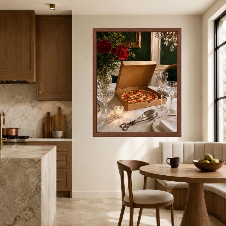 May include: A framed wall art print depicting a cardboard pizza box containing a whole pizza, placed on a table with crystal glassware, silver serving utensils, a small lit candle, and a vase of red flowers in a dark, elegant setting.