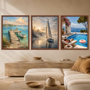 May include: Three framed wall art prints featuring coastal scenes. The left shows a wooden pier with chairs and a boat on blue water. The center depicts a sailboat on misty water at sunrise. The right shows a pool overlooking the sea with a person.