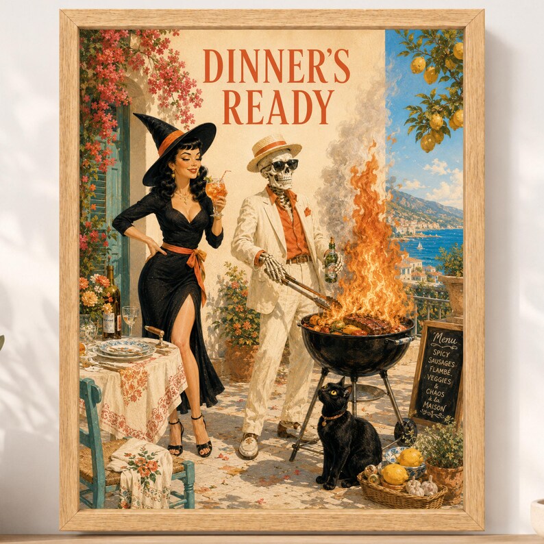 May include: A framed wall art print titled DINNER'S READY featuring a witch in a black dress and a skeleton in a beige suit grilling food over a large fire. A black cat sits nearby on a patio with a coastal view, lemon trees, and a menu board.
