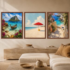 May include: A set of three framed wall art prints featuring coastal scenes. The left print shows a wooden boat in turquoise water with pink flowers. The center print depicts a red beach umbrella on sand. The right print shows a stone staircase.