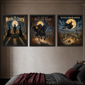 May include: Three framed wall art prints featuring dark fantasy scenes. The left print shows three figures in black robes titled The Moonlit Coven. The center print depicts a headless horseman titled The Rider of Hollow Road. The right print shows a witch flying over a village titled The Witch Above Blackwood.