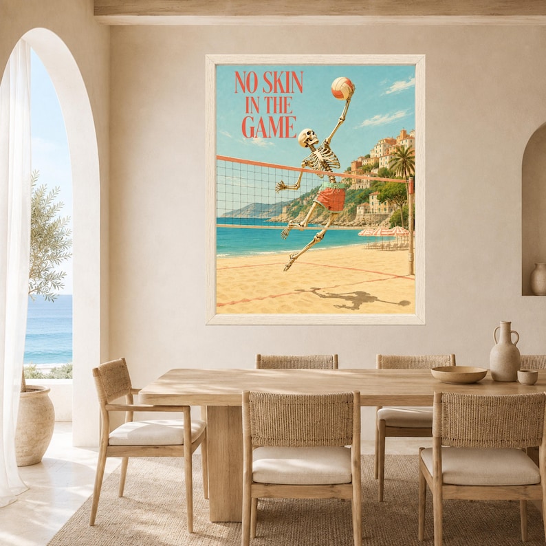 May include: A framed wall art print featuring a skeleton playing volleyball on a sandy beach. The skeleton wears red shorts and jumps to hit a volleyball over a net. The text NO SKIN IN THE GAME is printed in red at the top against a blue sky.