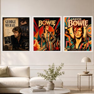 May include: Three framed wall art prints featuring musical icons. The left print shows George Michael with the text Faith. The middle print depicts David Bowie in a colourful suit with a rocket. The right print shows David Bowie with the text Starman Rebel Icon.