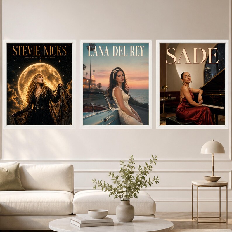 May include: Three framed wall art prints featuring musical artists. The left print shows Stevie Nicks before a large moon. The center print depicts Lana Del Rey by a car at sunset. The right print shows Sade sitting at a grand piano.