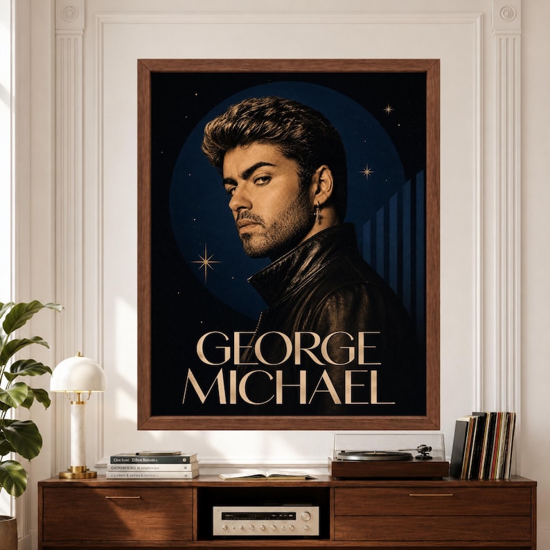 Framed George Michael wall art featuring a vintage-inspired 1980s pop portrait in a black leather jacket against a deep blue celestial background with subtle stars and large elegant George Michael typography above a record player console.