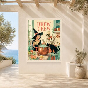 May include: A rectangular wall art print titled BREW CREW featuring a witch in a black hat, a skeleton, and a black cat gathered around a copper cauldron. The scene includes citrus fruits, glass bottles, and kitchen items in a warm, vintage style.