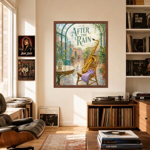 May include: A framed wall art print titled After the Rain, featuring a golden saxophone resting on a wicker chair in a sunlit courtyard with a table, potted plants, and a tiled floor, displayed in a room with bookshelves and a record player.