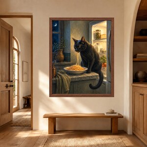 May include: A framed wall art print depicting a black cat sitting on a kitchen counter, eating spaghetti from a bowl. The cat is positioned in front of an open refrigerator with visible food items, set against a dark, moody kitchen background.