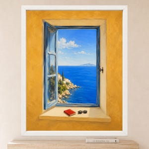 May include: A framed painting depicting an open window with a blue frame set in a textured yellow wall. The view shows a bright blue sea, a rocky coastline with white buildings, and a clear sky. A small red book and black sunglasses sit on the sill.