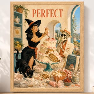 May include: A framed art print titled PERFECT featuring a witch in a black dress and hat decorating a multi-tiered cake alongside a skeleton wearing a hat and sunglasses. A black cat stands on the table near bowls of ingredients and a book.