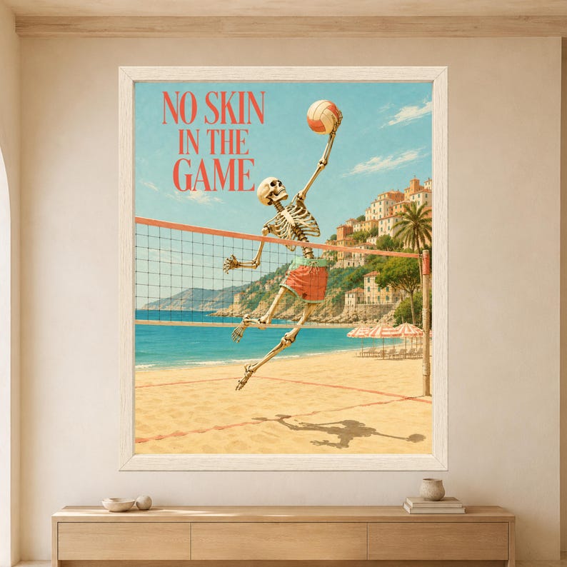 Framed No Skin in the Game skeleton wall art featuring a skeleton jumping for a volleyball spike on a sunny Mediterranean beach with turquoise sea, palm trees and hillside villas.