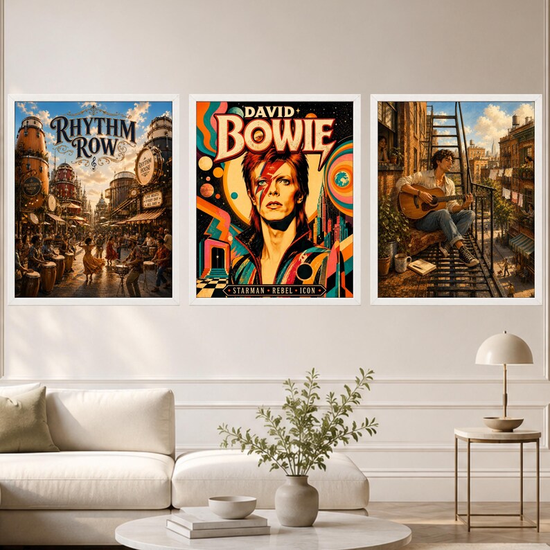 May include: Three framed wall art prints displayed in a row. The left print shows a bustling street scene titled Rhythm Row. The center print features a colorful portrait of David Bowie with the text Starman Rebel Icon. The right print depicts a person playing an acoustic guitar on a fire escape.