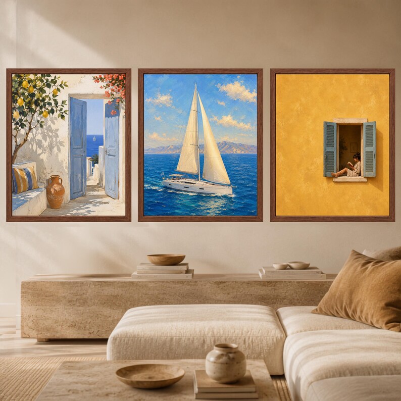 May include: A set of three framed wall art prints. The left print shows an open blue door with a lemon tree and a clay pot. The center print depicts a white sailboat on blue water under a cloudy sky. The right print features a person in a yellow window.