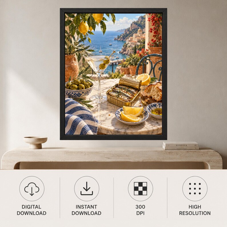 May include: A framed wall art print depicting a Mediterranean coastal scene on a marble table. The image features a martini glass with olives, a tin of sardines, lemon wedges, bread, and a blue and white striped cloth, set against a sea view.