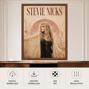 May include: A framed wall art print featuring a portrait of Stevie Nicks with the text STEVIE NICKS and BELLA DONNA DREAMS. The image shows a person with long blonde hair wearing a lace shawl over a black top, set against a large moon.