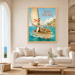 May include: A framed wall art print featuring a skeleton wearing sunglasses, a white suit, and a red scarf, steering a sailboat on blue water. The text BONE VOYAGE is printed in red at the top. The boat carries two suitcases and a bouquet of flowers.