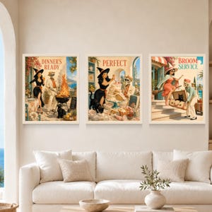 May include: Three framed wall art prints featuring retro-style illustrations of a witch and a skeleton. The first print says DINNER'S READY, the second says PERFECT, and the third says BROOM SERVICE, all depicting whimsical scenes with a black cat.