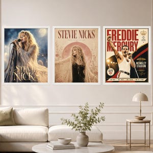 May include: Three framed wall art prints featuring musical icons. The left print shows Stevie Nicks singing, the center print depicts Stevie Nicks with the text "STEVIE NICKS", and the right print shows Freddie Mercury with the text "FREDDIE MERCURY".