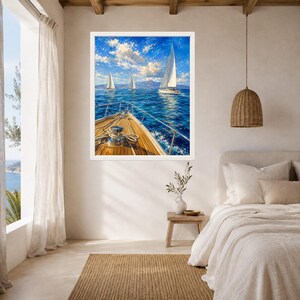 May include: A framed wall art print depicting a view from the wooden deck of a sailboat looking out over deep blue ocean waters toward three white sailboats under a bright blue sky with scattered white clouds and distant mountains on the horizon.