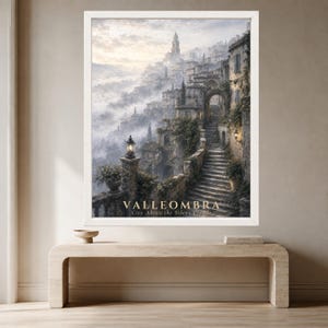 May include: A framed wall art print depicting a hillside town shrouded in mist, featuring stone buildings, a prominent staircase, and a lantern. The text VALLEOMBRA City Above the Silent Clouds is printed in gold at the bottom of the artwork.
